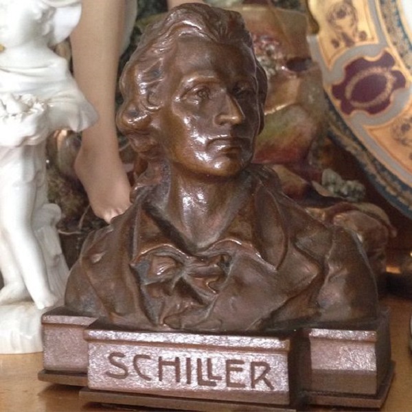 antique bronze of boy